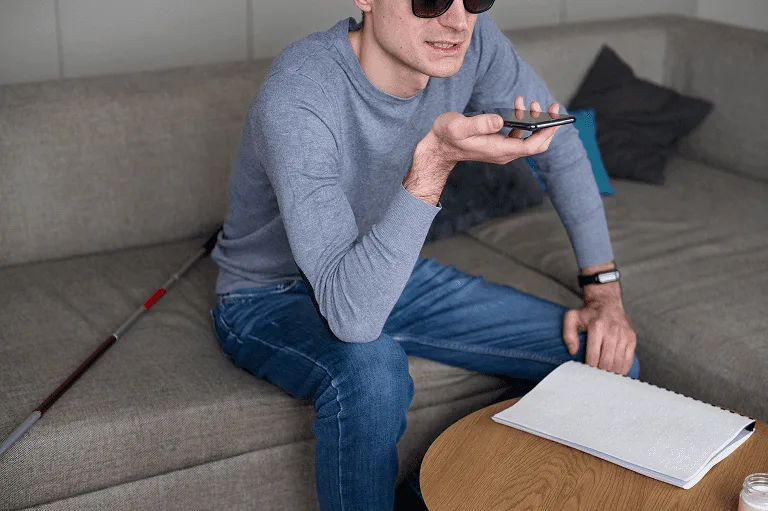 blind-man-talking-his-smartphone-min.png