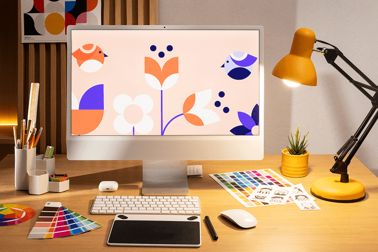 Ordinateur avec une multitude de couleurs sur un bureau lumineux