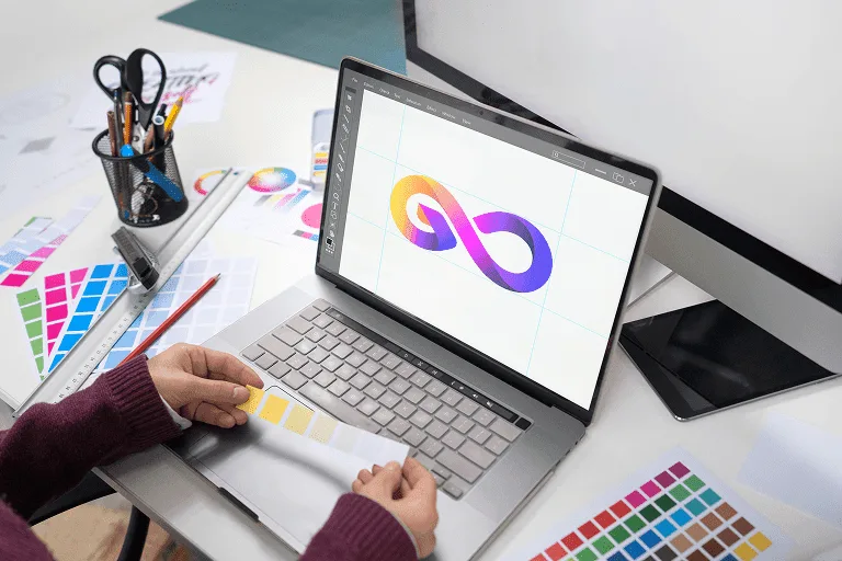 young-female-designer-working-her-laptop-min.png